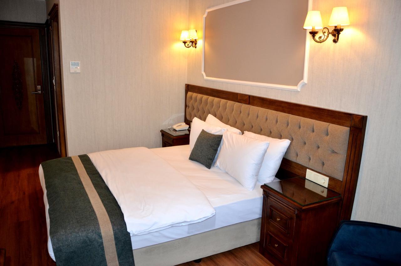 Ahmet Efendi Konagi Hotel Isztambul Kültér fotó A bedroom at the hotel