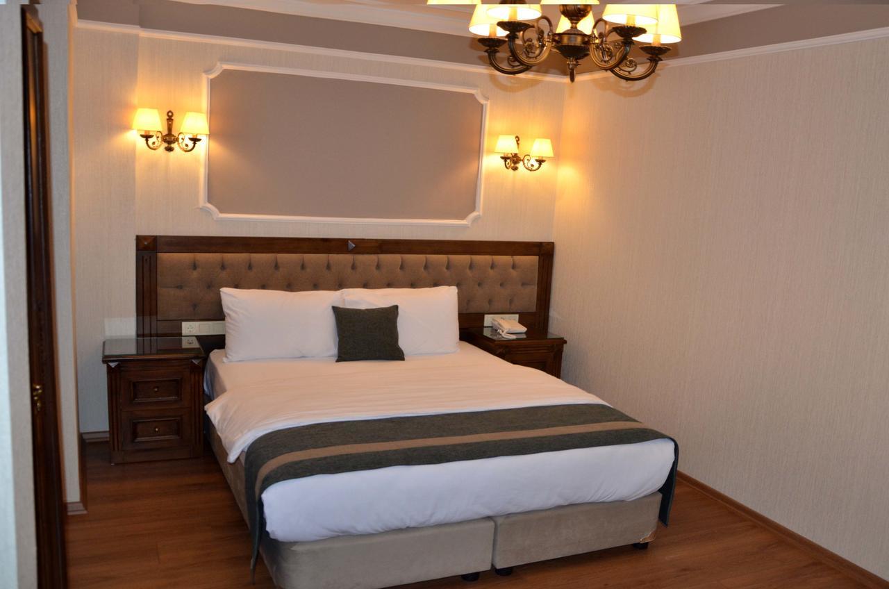 Ahmet Efendi Konagi Hotel Isztambul Kültér fotó A bedroom at the hotel